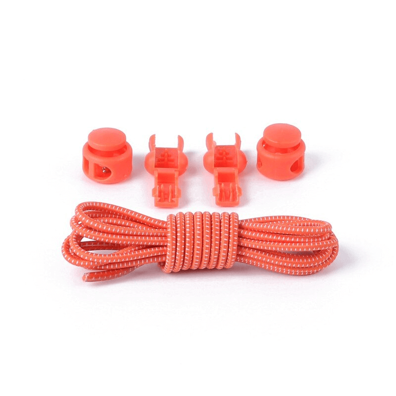 Bright orange elastic shoe laces with spring buckles and tail clips for easy no-tie setup, perfect for sports shoes.